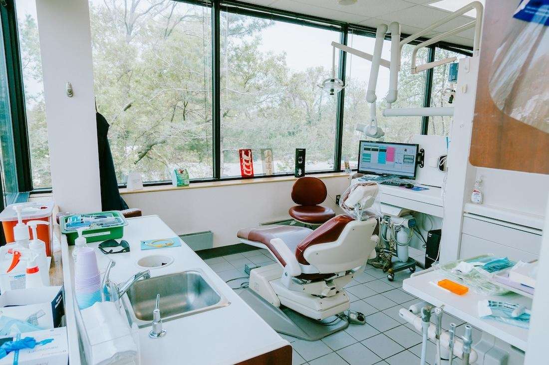 Operatory with Green Chair and Mounted X-Ray Equipment of Pineview Dental in Columbia, MD